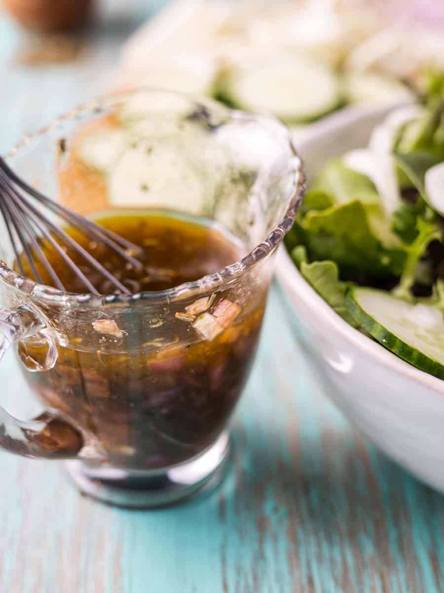 blackcurrant vinaigrette in a glass cup
