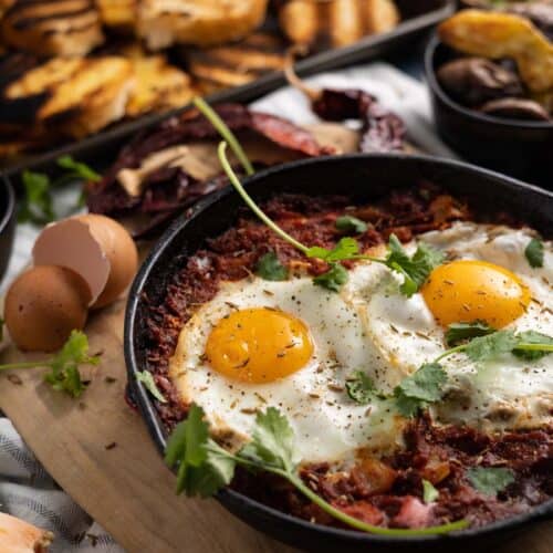 mexican baked eggs in a castiron pan