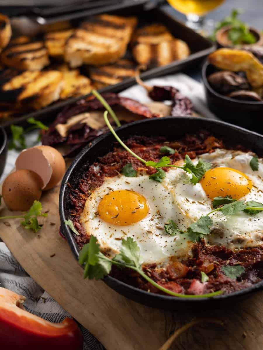 mexican baked eggs in a castiron pan