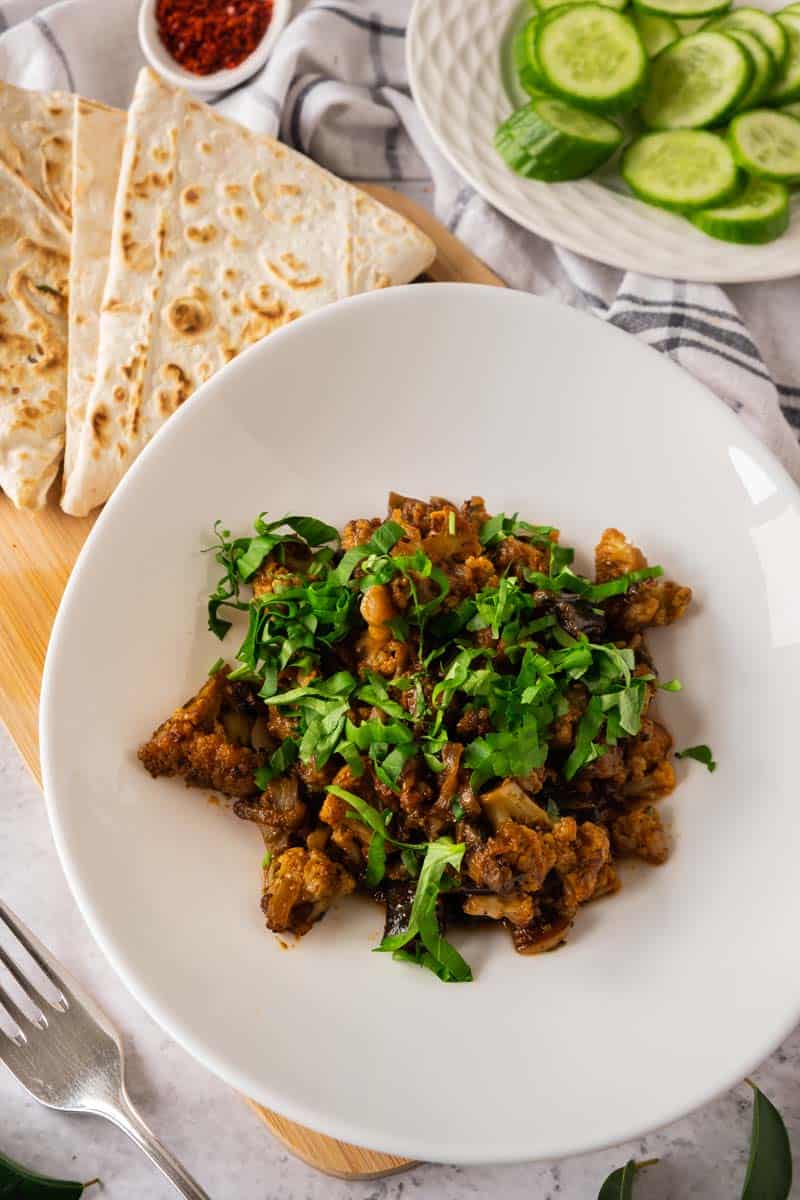 Vadouvan Cauliflower and Eggplant in plate.