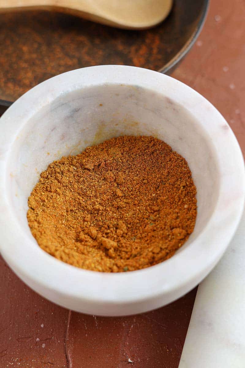 ground vadouvan spices in a mortar