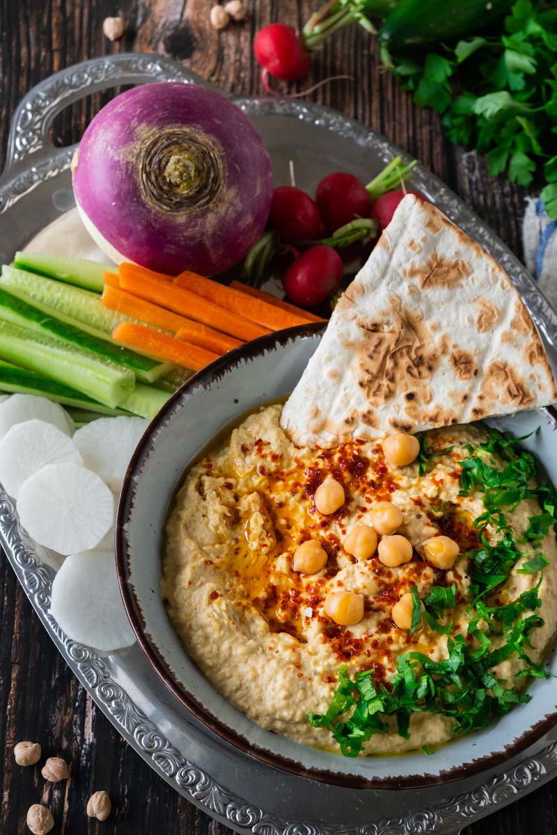 Hummus and Vegetables on Platter with veggies.