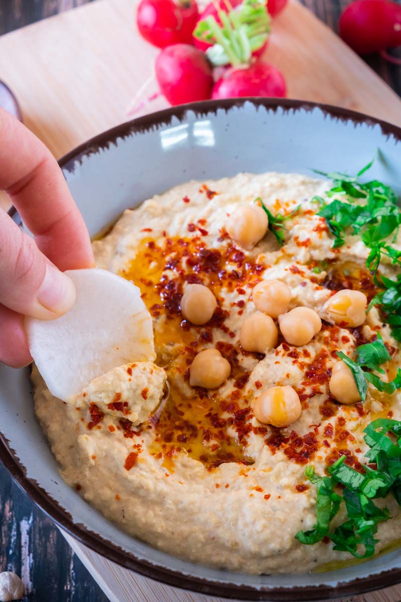 Hummus and Vegetables on Platter with veggies.