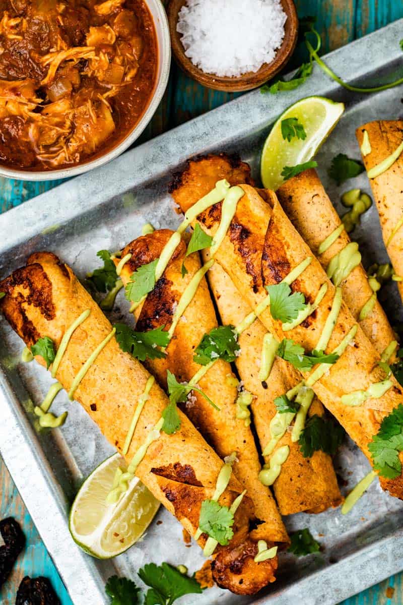 Taquitos de Tinga de Pollo with Avocado Mint Crema