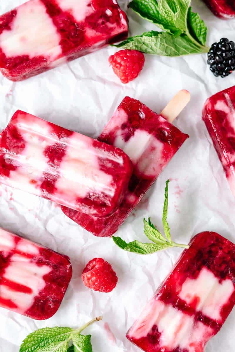 masala berry popsicles on parchment paper