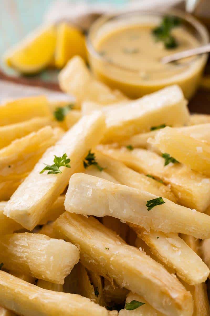 yuca fries on a serving board